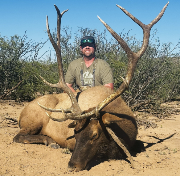 Hunter with Elk